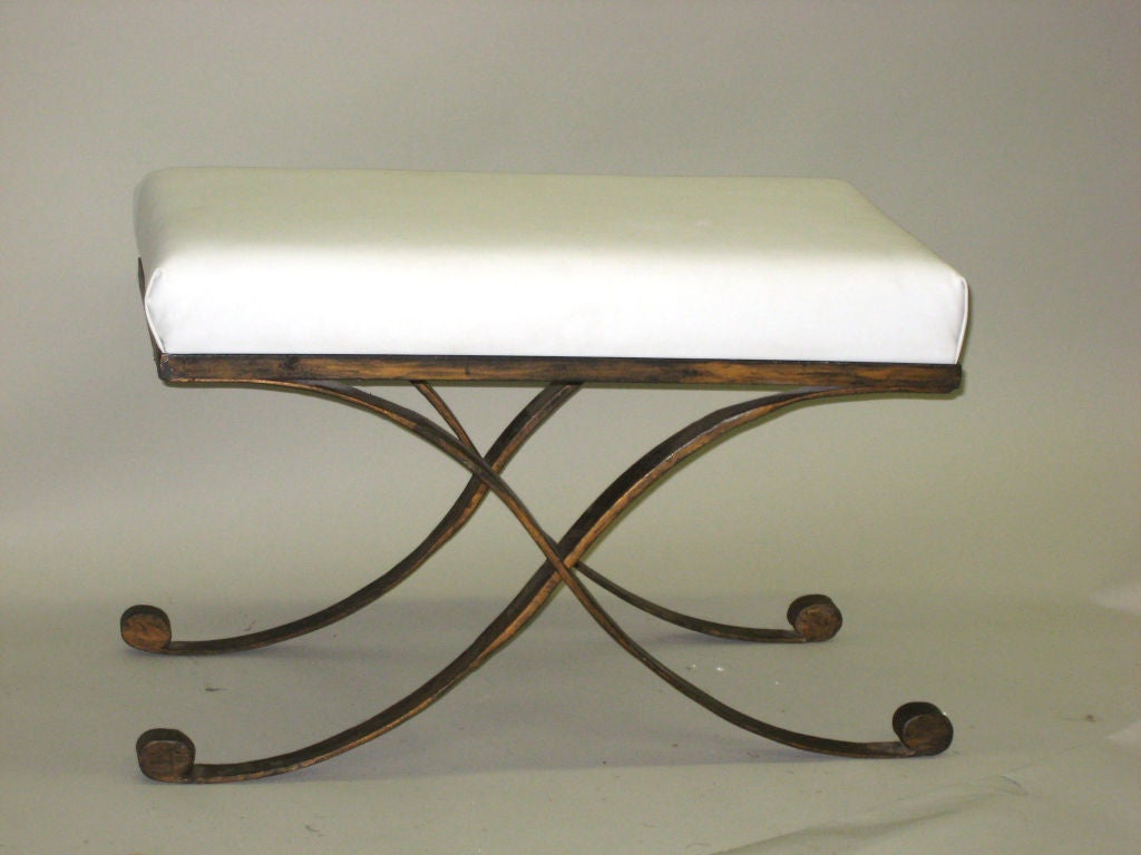 An Elegant Pair of X-frame Form Gilt Wrought Iron Benches Attributed to French Master Iron Worker, Raymond Subes.