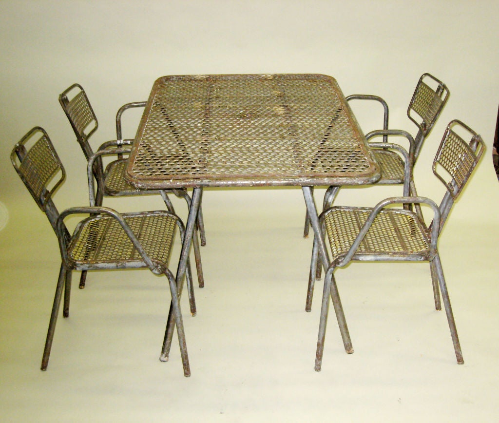 Steel Table and 8 Armchairs in the Manner of Jean Prouve