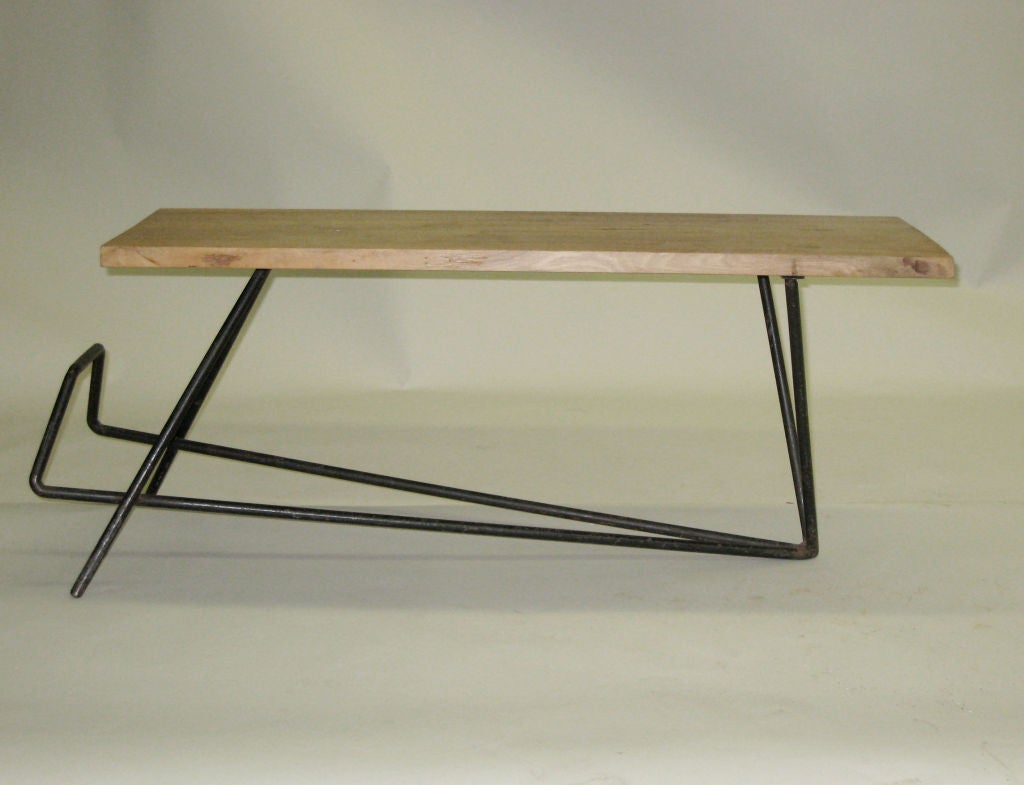 Important Architectural French Mid-Century Modern Coffee Table / Bench by Pierre Guariche with a Stunning Articulating, Angular Wrought Iron Base. The piece is multi-purpose serving as a bench and a table with magazine stand.