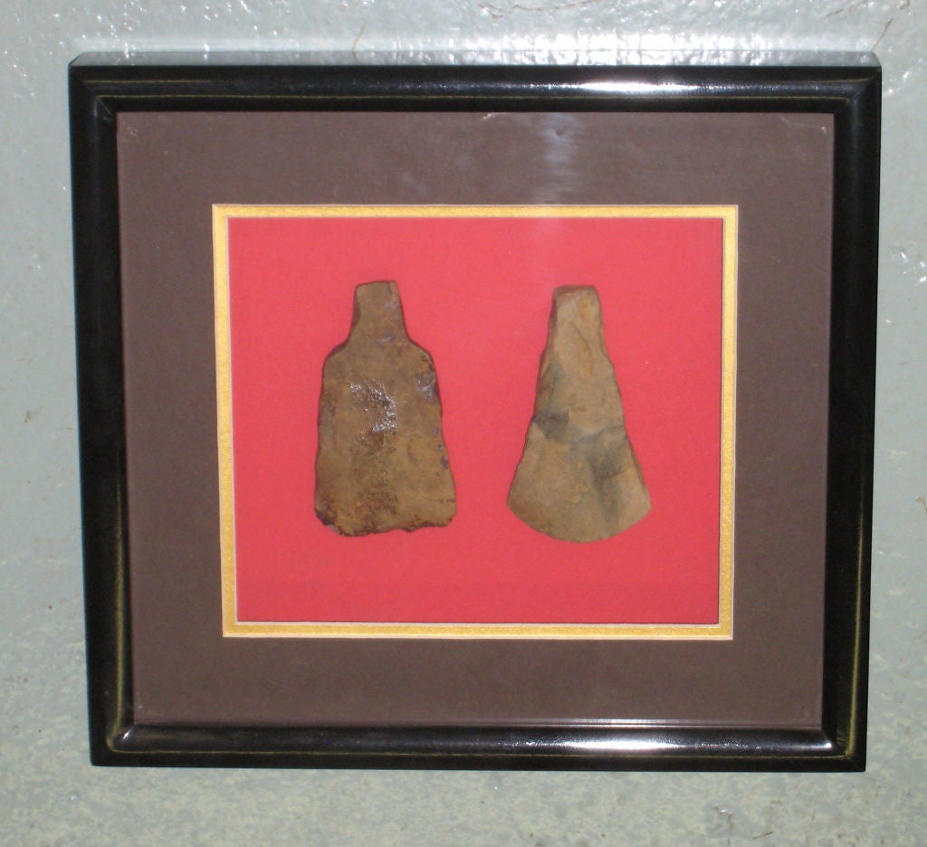 A Collection of Stone Adzes and Tools from  Southeast Asia, Neo-Lithic Age in Origin and Framed in 4 Black Lacquered Boxes.  

Origin: Excavated from Circular Earthwork Sites in Kampong Cham province, Cambodia. 

The Collection of Several