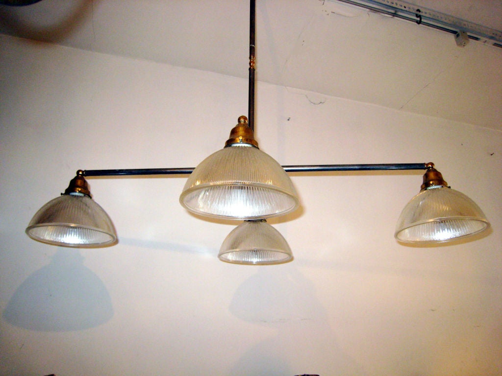 Elegant, sober steel and brass four-light ceiling fixture excellent for kitchen / dining and pool table !