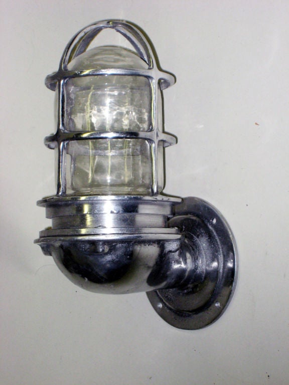 Pair of Swedish Mid Century Modern Marine Industrial Wall Sconces from a Luxury Ship.

Sold and priced by the pair.