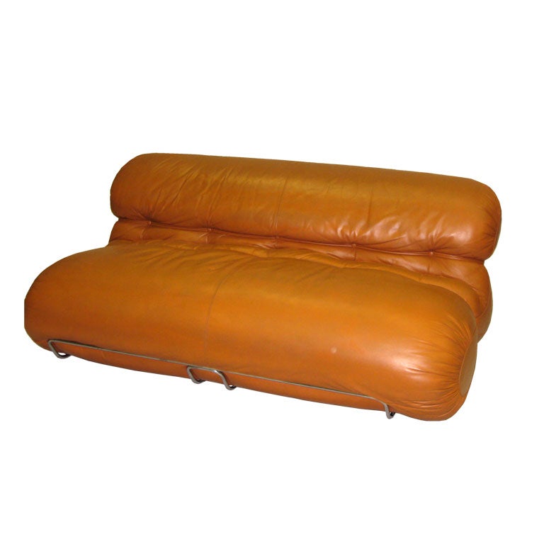 Chic, stunning and comfortable leather sofa/settee. A dramatic soft sculpture, more interesting than Tobia and Afra Scarpa's Soriana model. This piece and Joe Colombo's Tube chair symbolized a sculptural approach to furniture and the allure of