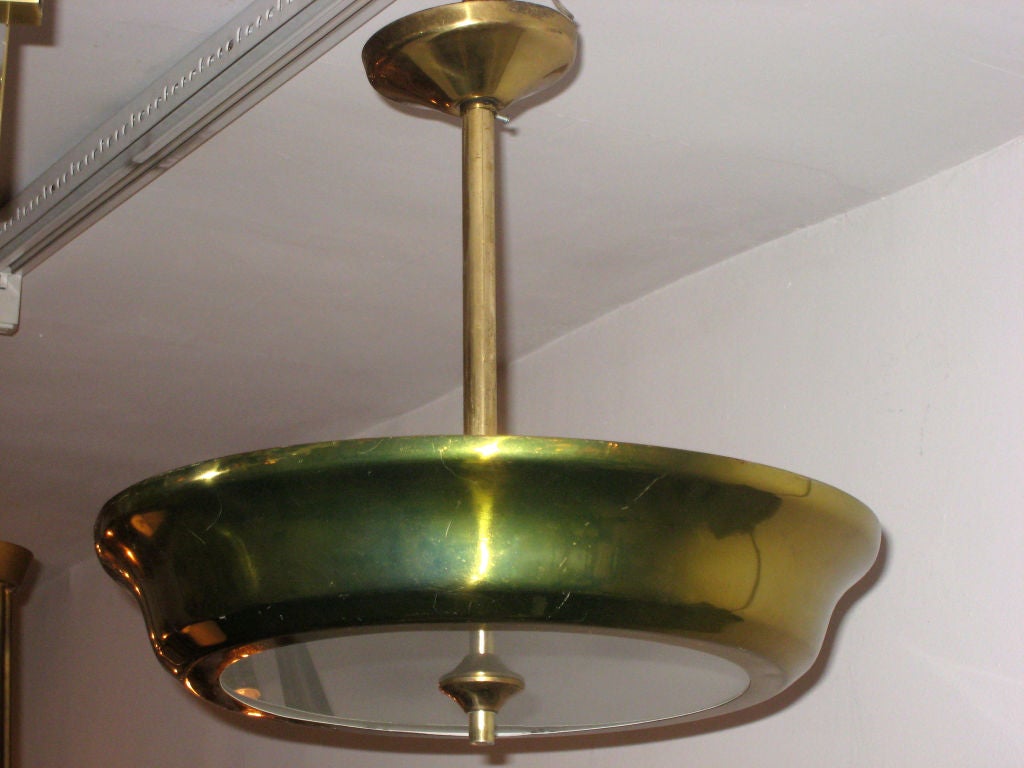 Elegant, Sober French Flush Mount Ceiling Fixture / Pendant in the Modern Neoclassical Spirit with Brass Frame and a Satinized Glass Center Panel. The fixture can flush mount if desired. 