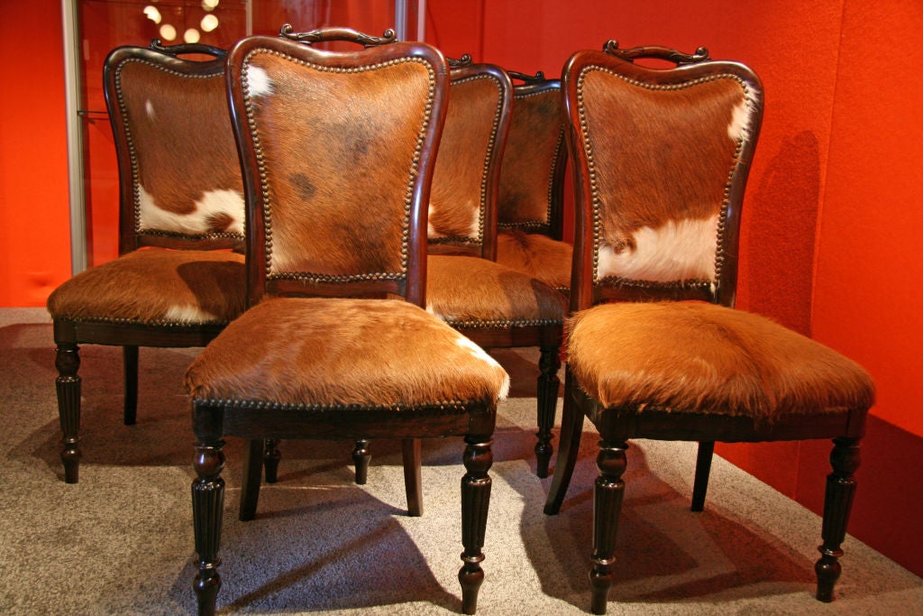 Italian, 1840 Livornese “English Makers” mahogany dining chairs.

With newly upholstered cow hide.