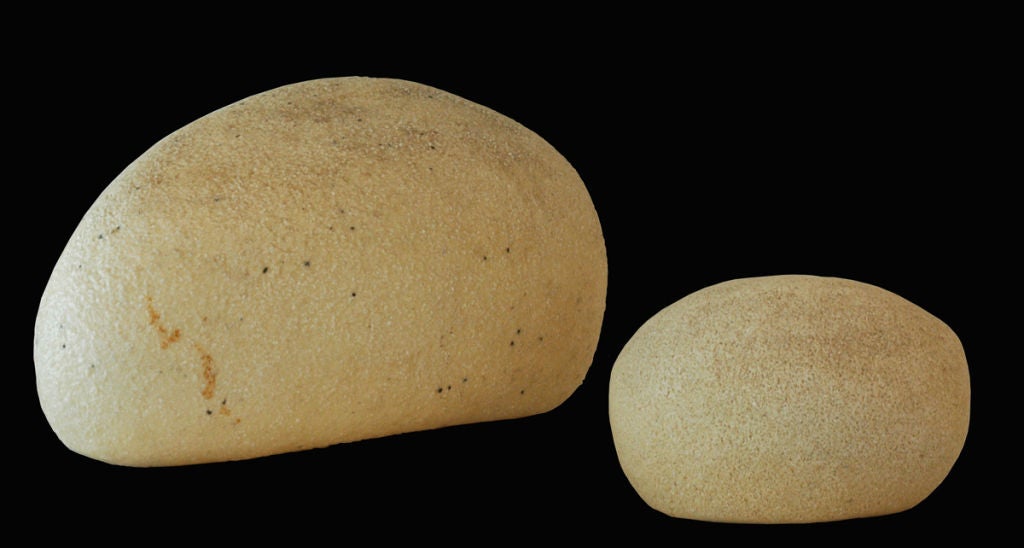 Unique pair of one large and one small faux rock lamps from Atelier Paris. The small measures 6.5 H x 9 W x 7 D. The large measures 10.5 H x 17 W x 10 D.