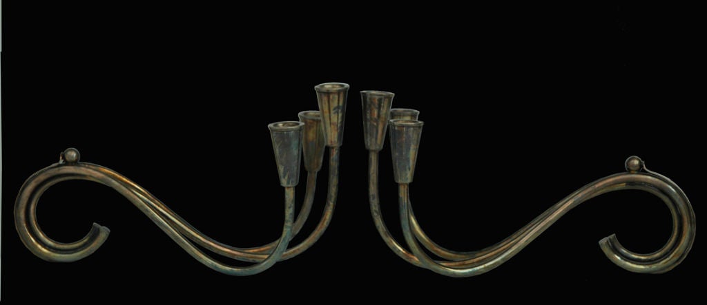 Pair of sterling silver scroll candleholders with patina