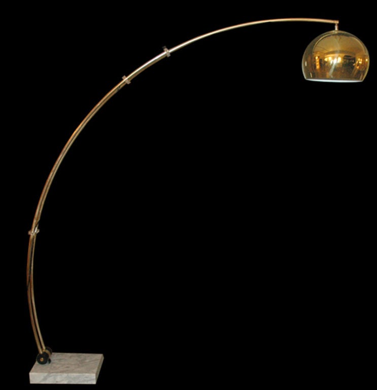 adjustable slide arc floor lamp by Reggiani in brass with lucite details and Carrera marble base