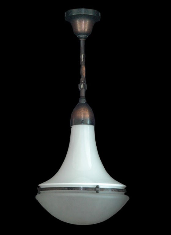 milk and matte glass suspended from plated iron chain