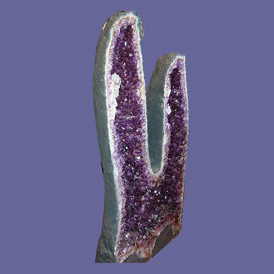 Pair of cactus amethyst mineral specimens.