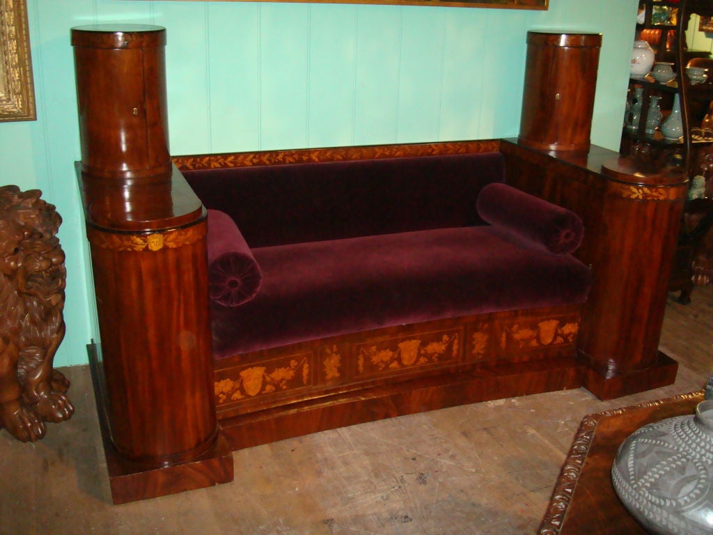 19th century inlaid mahogany sofa with cupboards.