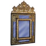 French 19th century dore brass repousse mirror with crested top.
