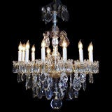 French 12 light chandelier with shaped and faceted crystals