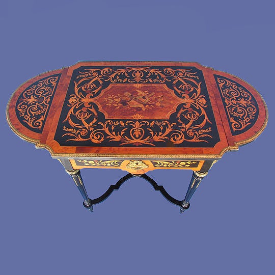 Pair of French 19th century companion marquetry drop-side tables with outstanding marquetry inlay and bronze appointments. Circa 1870<br />
FOR MORE INFORMATION, PLEASE VISIT WWW.CONNOISSEURANTIQUES.COM