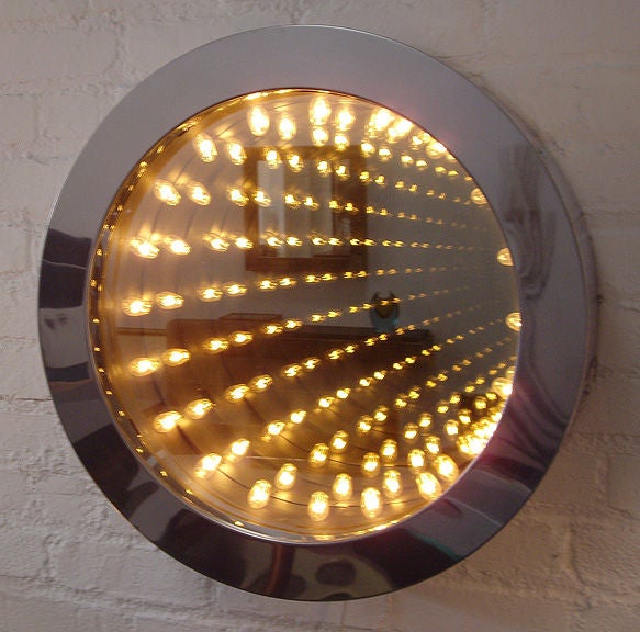 Polished chrome and glass infinity light by Jere. When off, it is a mirror. When illuminated it becomes an infinity light. There are two settings for bright and brighter.<br />
Quality design and construction.