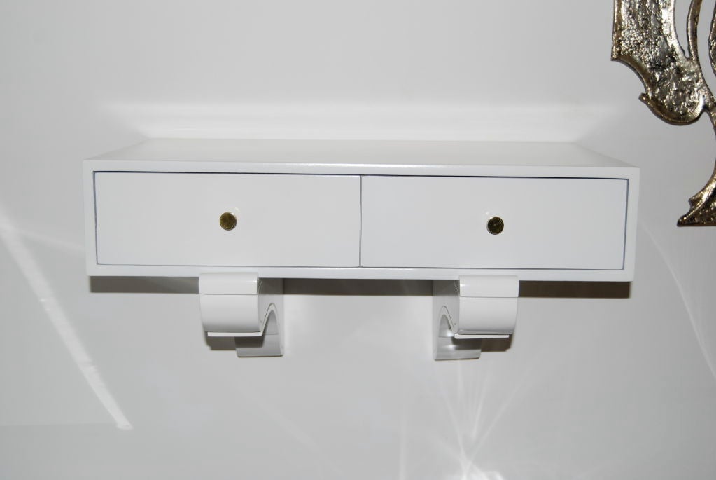 Pair of White Lacquer Wall Hung Consoles