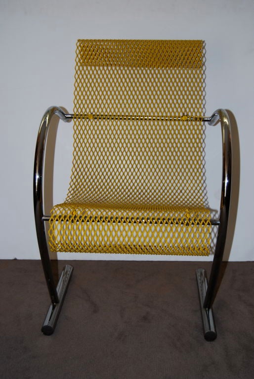 A magnificent design from this 'Ordre des Arts et des Lettres' awarded designer! The mesh provides a slight spring and makes these chairs very comfortable! These were manufactured in France by XO. Sold as a pair.