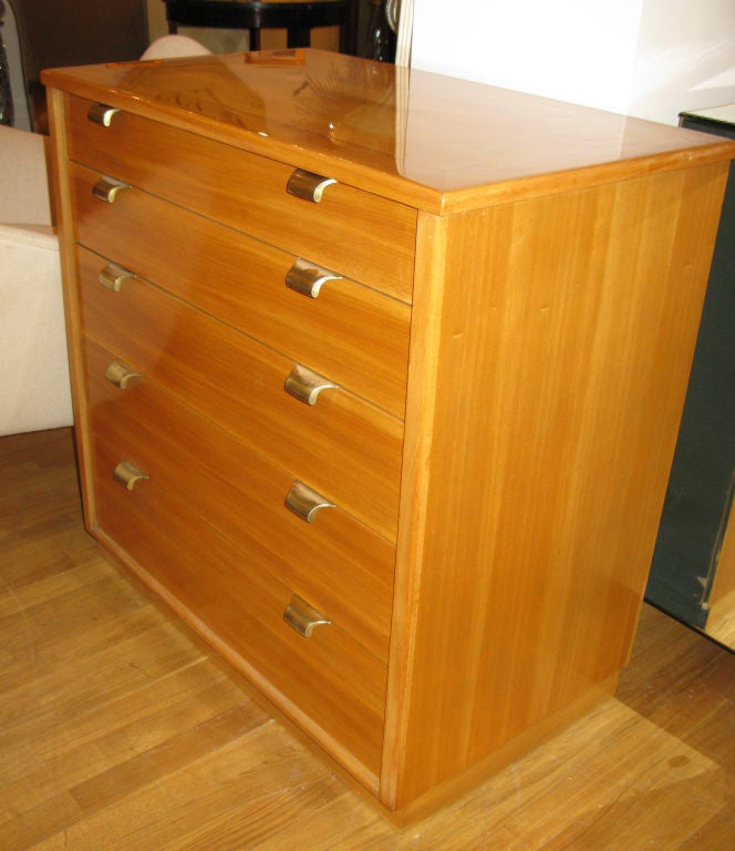 American 1970’s Lacquered White Oak Chest by Drexel.  <br />
Five graduated drawers (top drawer divided) with brass lip-pulls rest on plinth style base.  <br />
    <br />
32-1/4”L x 19”D x 32-1/2”H