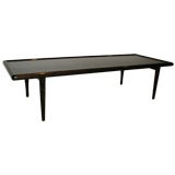 A Long T.H. Robsjohn-Gibbings Wooden Coffee Table.