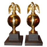 A pair of brass bookends