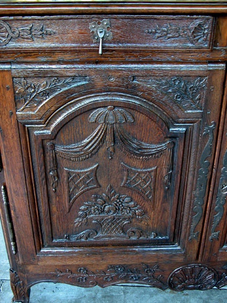 A Well-Carved French Provincial Oak 2-Door Sideboard