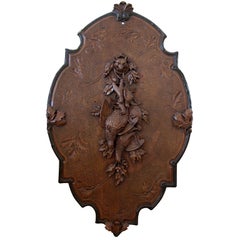 A German Black Forest Carved Applique of Hunting Trophies