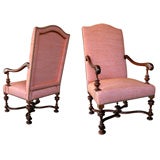 A Boldly-Scaled Pair of French Baroque Style Walnut Armchairs
