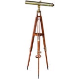 Antique An English Brass Telescope Raised on Adjustable Wooden Tripod