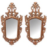 An Elegant Pair of Italian Rococo Style Carved Giltwood Mirrors