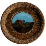 A  French Eglomise Circular Tray Depicting a Crowing Rooster