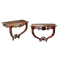 A Pair of French Louis XV Carved Walnut Wall Consoles