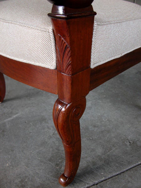 Carved A Gracefully Proportioned Pair of French Restauration Mahogany Armchairs