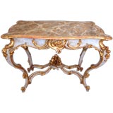 A Finely Carved German Rococo Style Rectangular Center Table