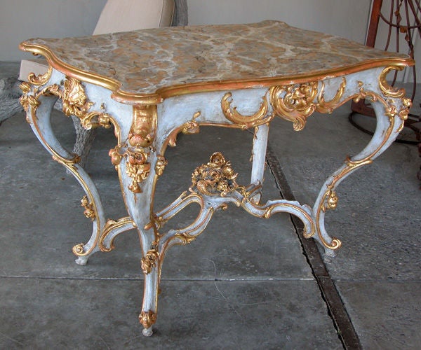A Finely Carved German Rococo Style Rectangular Center Table