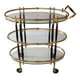 A Chic French Oval Brass Drinks Cart w/Ebonized Highlights