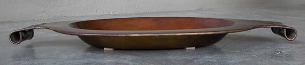 A large-Scaled English Arts & Crafts Copper Oval-Form Charger
