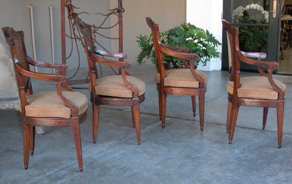 A Handsome Set of 4 Italian Neoclassical Fruitwood Shield-Back Caned Arm Chairs