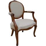 An English George III Carved Beechwood Armchair in the French Taste