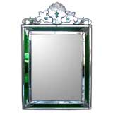 A Shimmering Venetian Mirror with Emerald Green Glass Frame