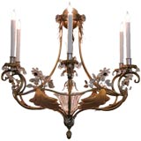 A Lyrical Italian Gilt Metal and Tole 7-Light Chandelier