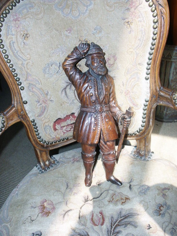 charming detailed carving of a man  this may be 18th C and it is carved oak and has some weight to it