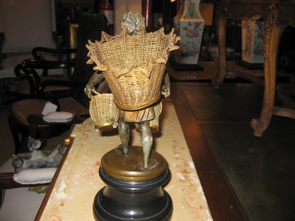 Mid-20th Century Charming Nubian Figure With Baskets