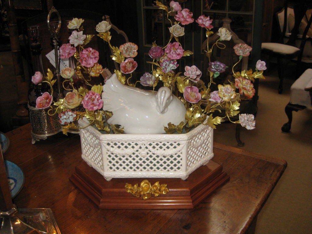 White Hen In A Basket With Flowers