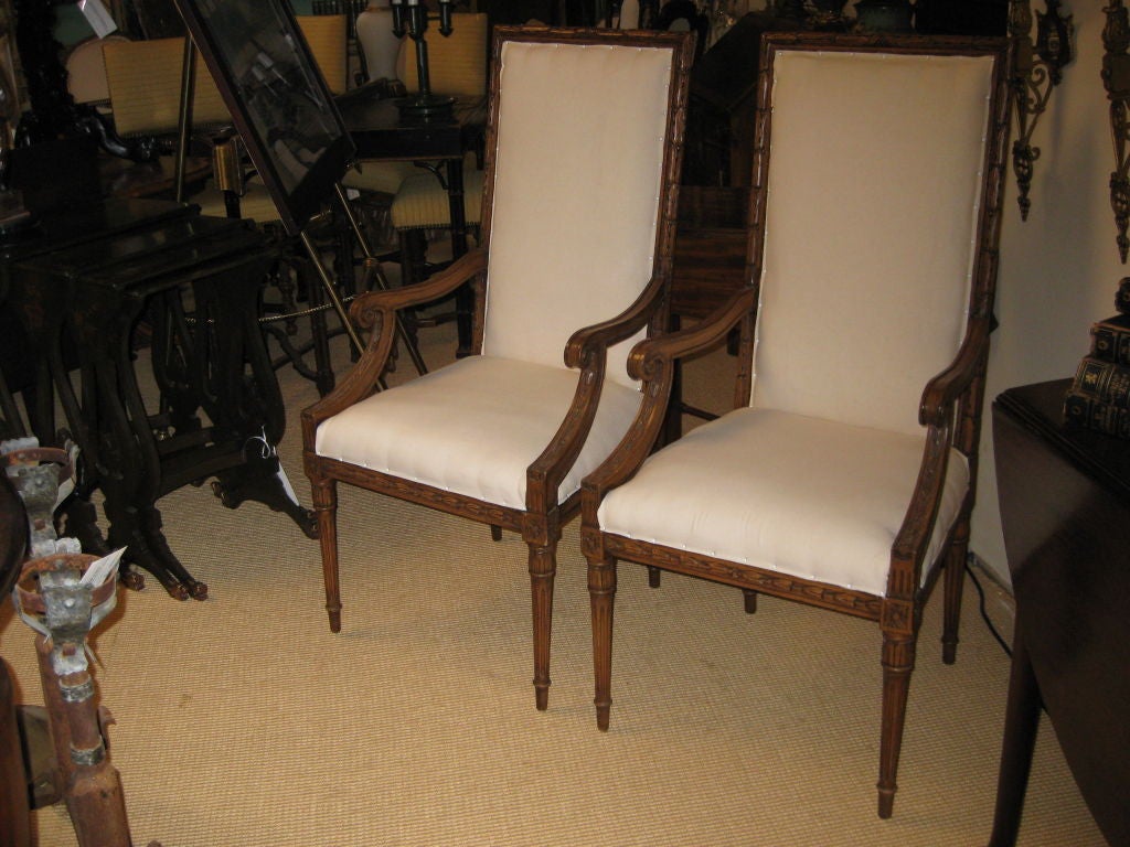 Pair of Carved Italian Arm Chairs