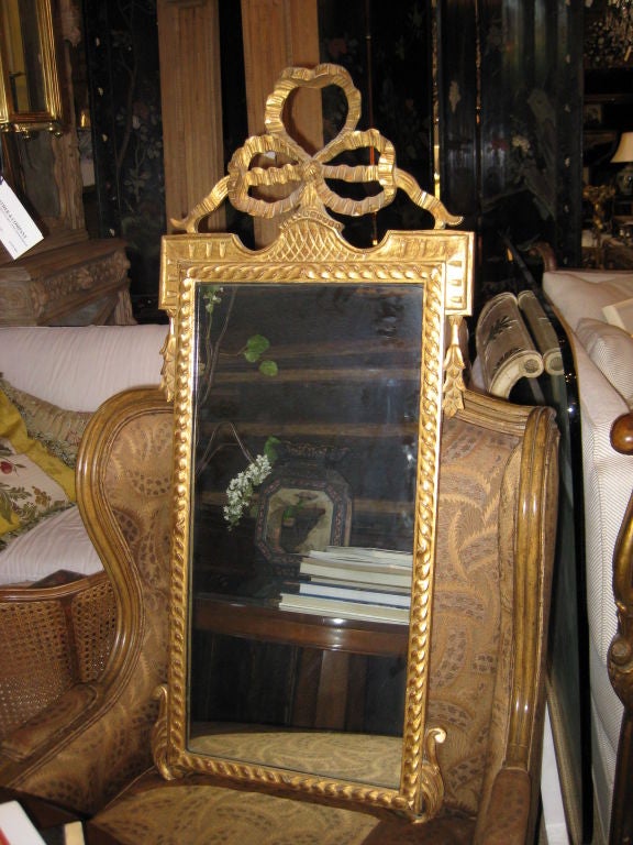 19th C Giltwood Mirror with Bow at the top