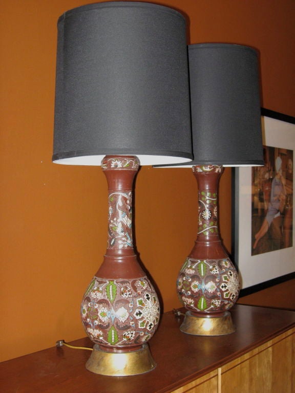Pair of hand-painted champleve table lamps in bronze with gilded wooden base.
Made in France, circa 1930.

The price listed is the final net price, which reflects a 50% reduction-extended through the Svenska Mobler closing sale. There are no