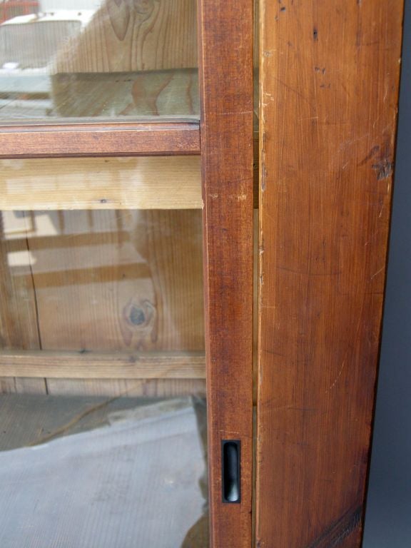 Japanese Display Tansu On Hand Wrought Iron Base