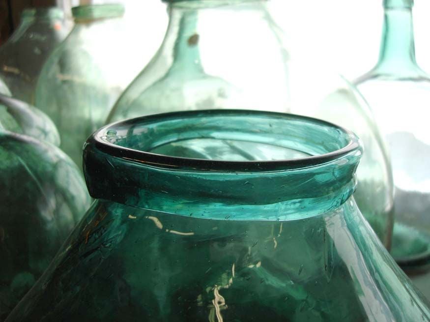 Antique glass wine bottles and open mouth- apothecary jars. Beautiful handblown glass, great blue greenish colors. Priced individually