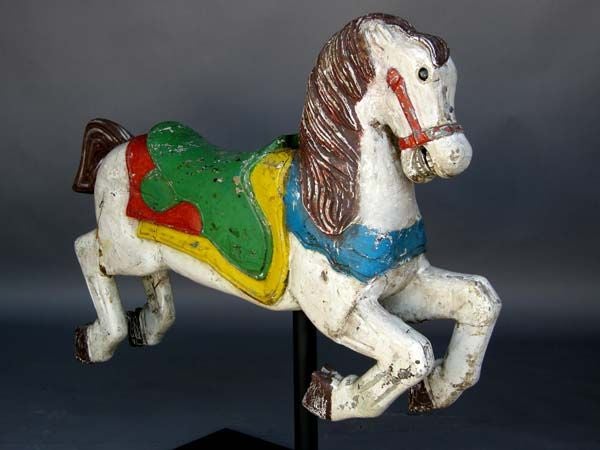 Great looking pair of fanciful carousel horses on iron bases. Bright original paint and carving. Great pieces of folk art! Children can actually sit on them! Sturdy and so much fun!