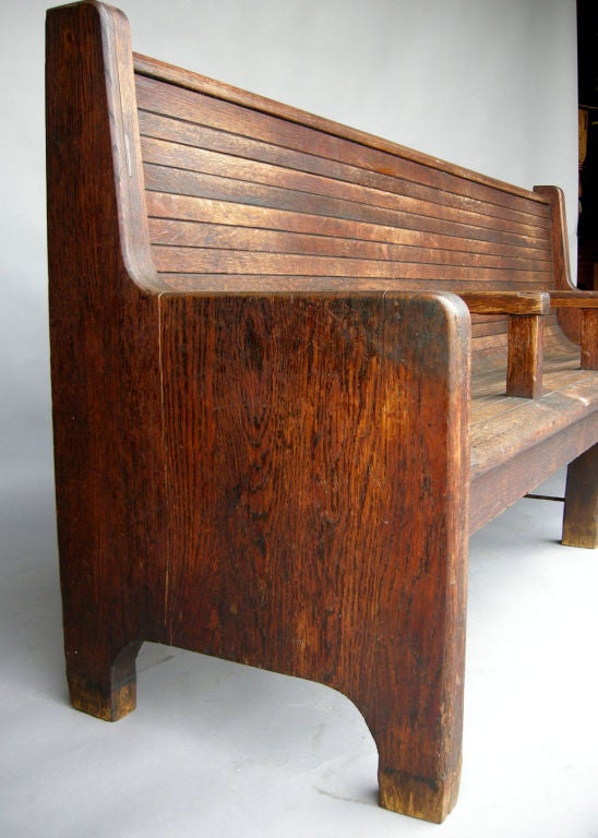 Great looking slatted oak bench from a Chicago trainstation. Great patina. A great piece of American history!